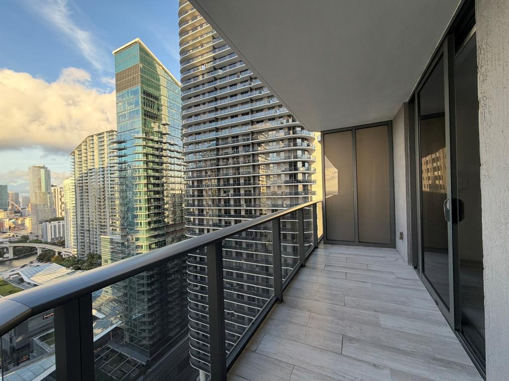 45 Southwest 9th Street, Unit 3110 Miami, FL 33130 - Photo 5 of 19 a view of balcony with wooden floor