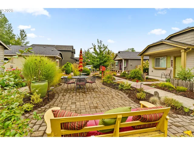 a view of a house with backyard