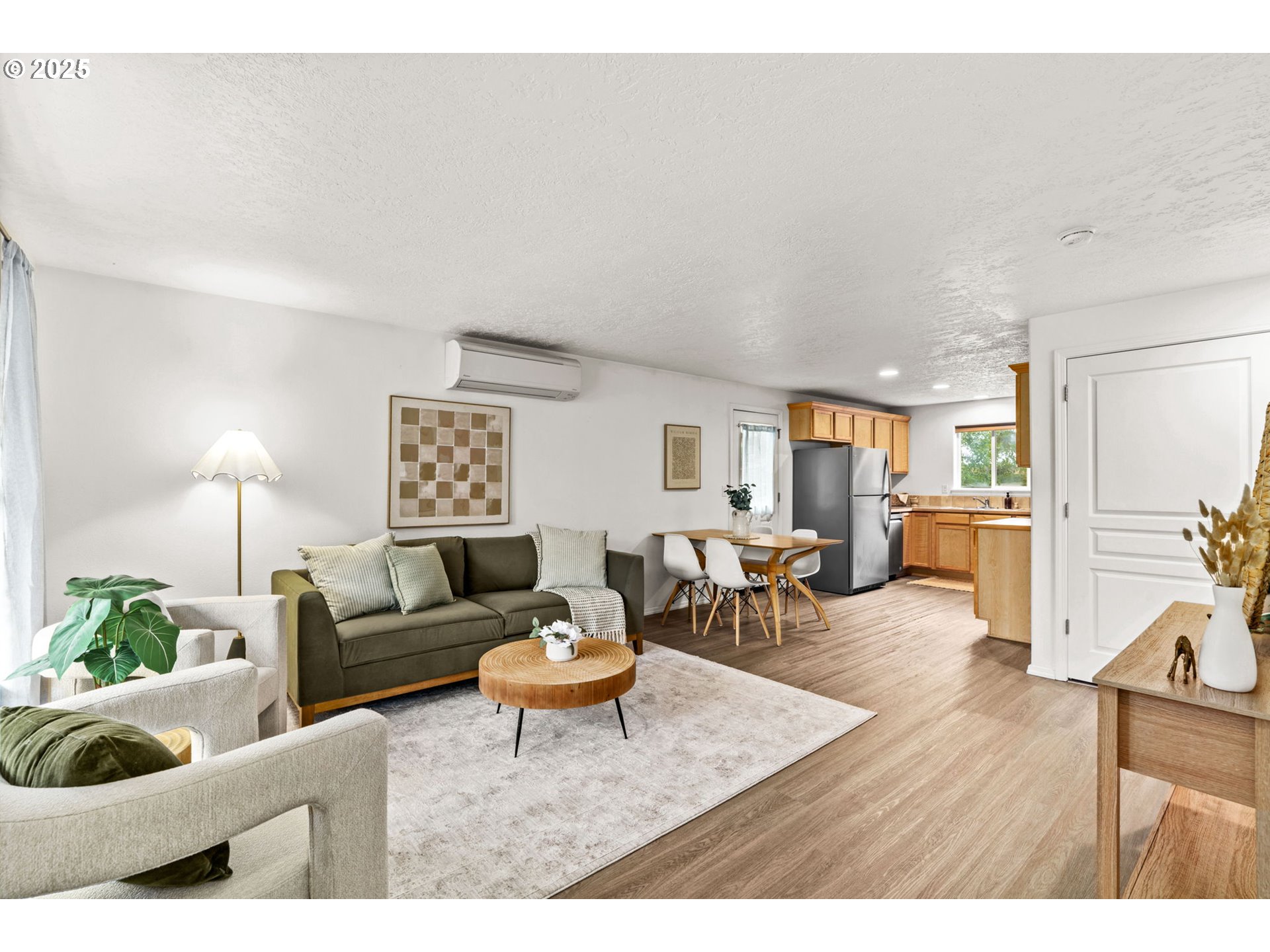 3031 Hummingbird Lane Eugene, OR 97405 - Photo 5 of 28 a living room with furniture and a wooden floor
