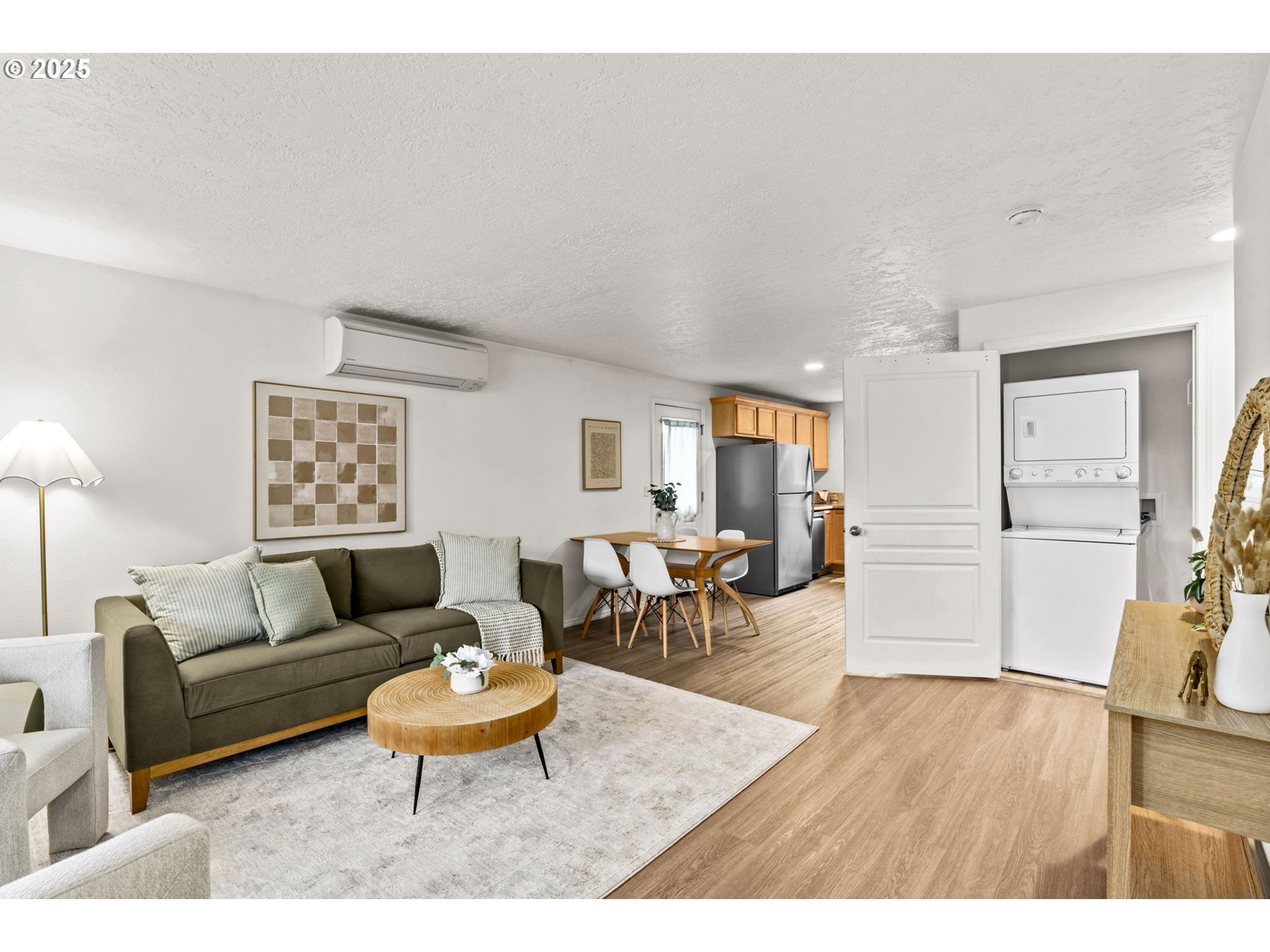 3031 Hummingbird Lane Eugene, OR 97405 - Photo 7 of 28 a living room with furniture and a wooden floor