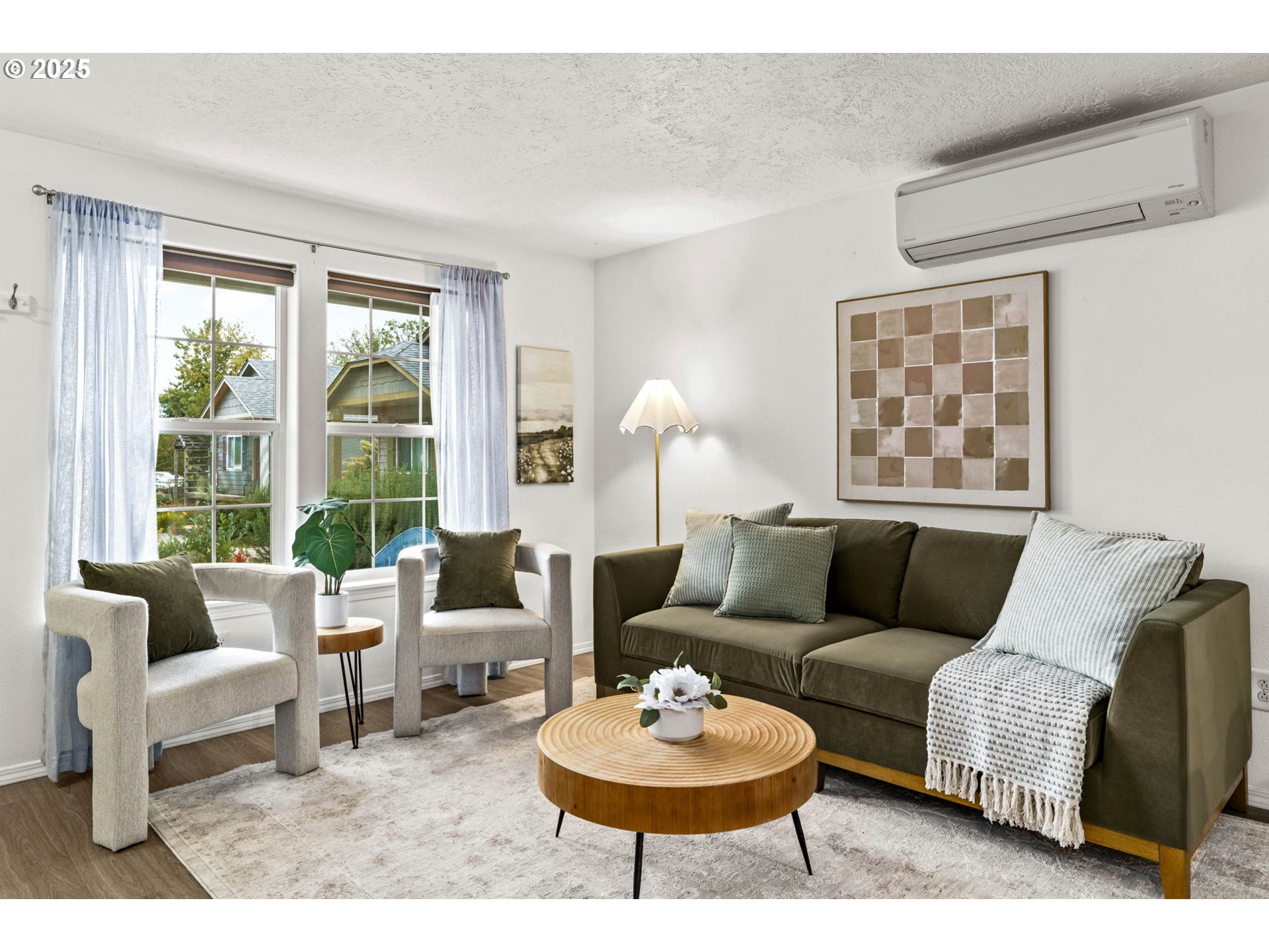 3031 Hummingbird Lane Eugene, OR 97405 - Photo 10 of 28 a living room with furniture a rug and a large window