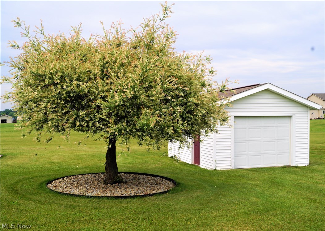 3206 Bandy Road Homeworth, OH 44634 - Photo 29 of 30 LOVELY TREE AND DETACHED GARAGE IN THE LARGE LEVEL BACKYARD!