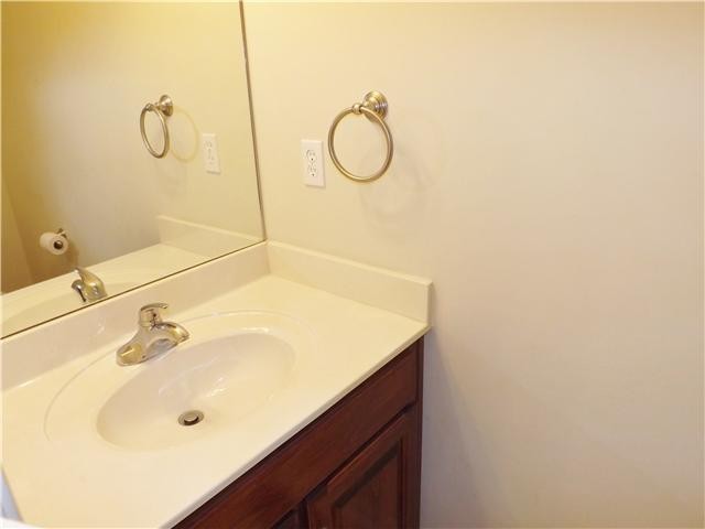 310 Indian Springs Circle Manchester, TN 37355 - Photo 16 of 31 a bathroom with a sink and a mirror