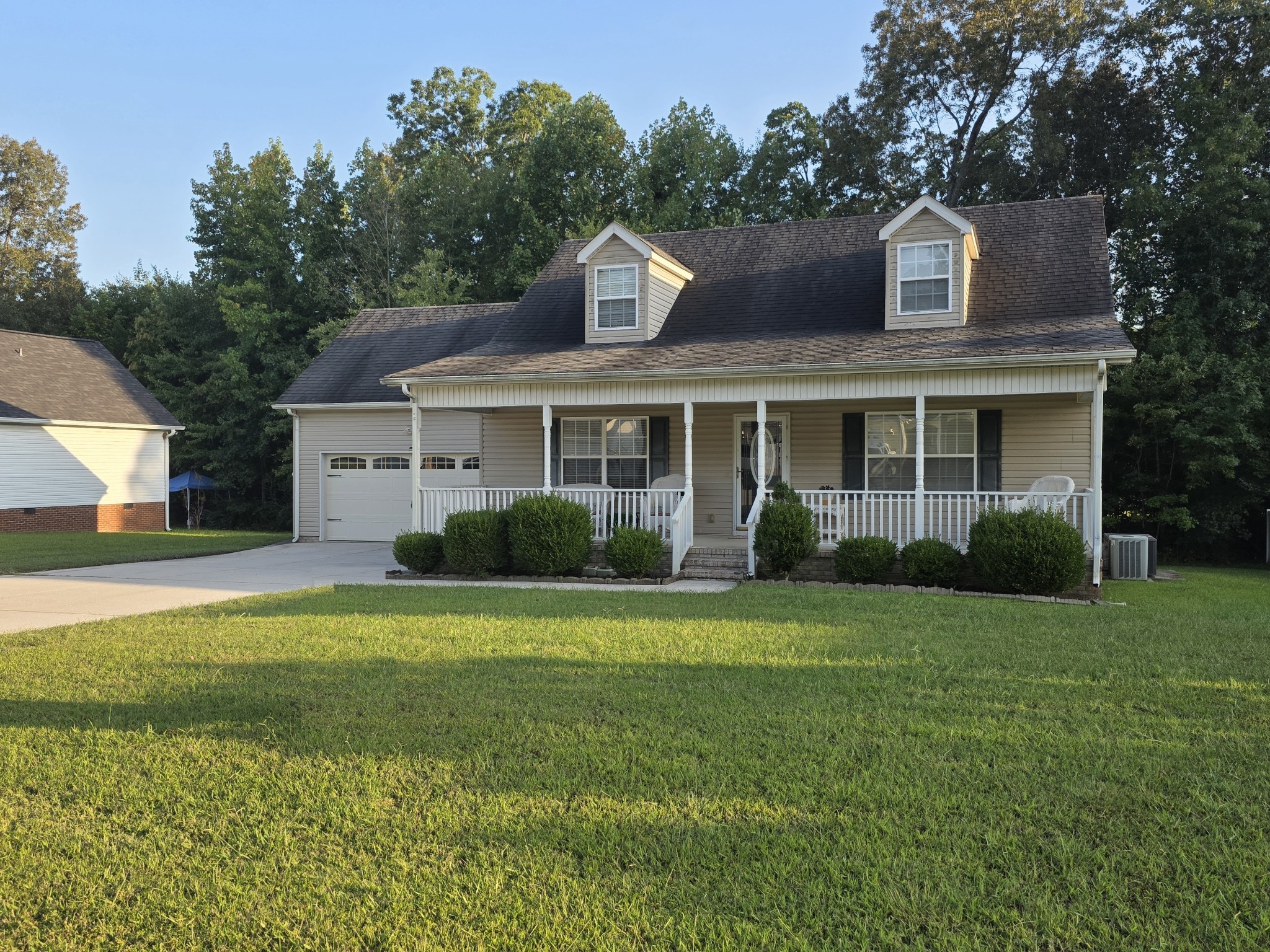310 Indian Springs Circle Manchester, TN 37355 - Photo 3 of 31 a front view of a house with a garden