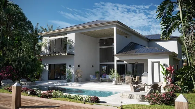 a front view of a house with garden and porch