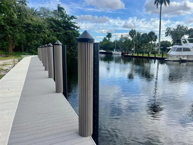 a view of a lake with a large trees