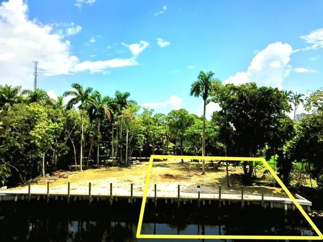 a view of swimming pool with seating area