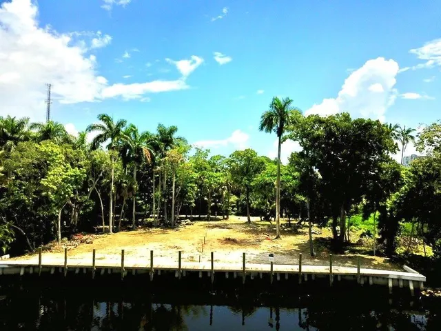 a view of swimming pool with outdoor seating and yard