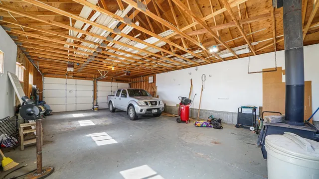 a view of a garage with cars