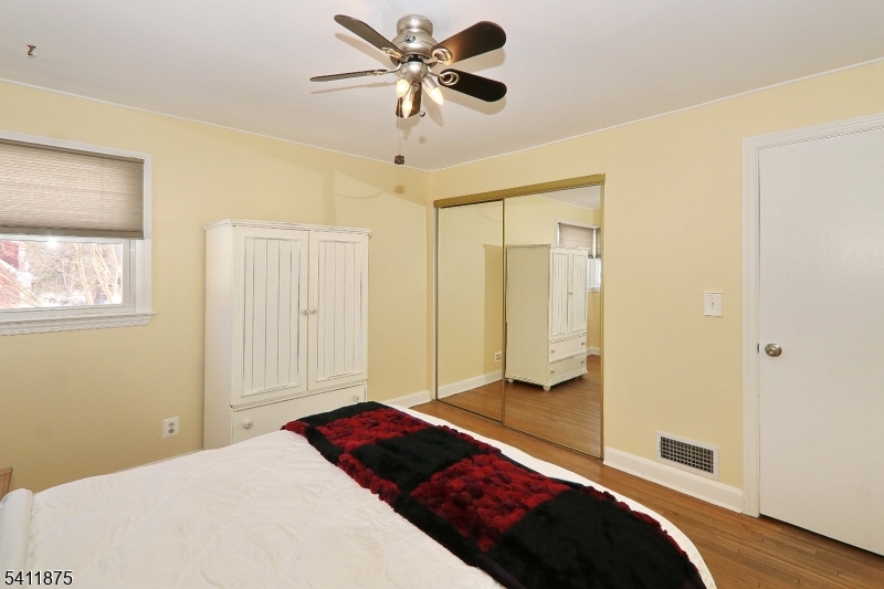 1314 Wood Valley Road Mountainside, NJ 07092 - Photo 20 of 40 a bedroom with a bed and a window