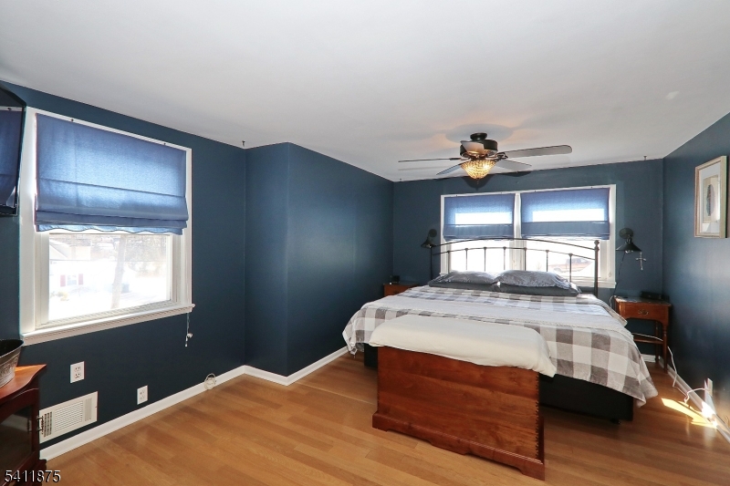 1314 Wood Valley Road Mountainside, NJ 07092 - Photo 21 of 40 a bedroom with a bed and a window