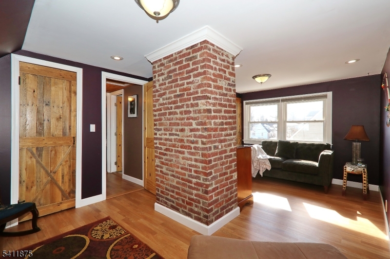 1314 Wood Valley Road Mountainside, NJ 07092 - Photo 28 of 40 a living room with furniture and a window