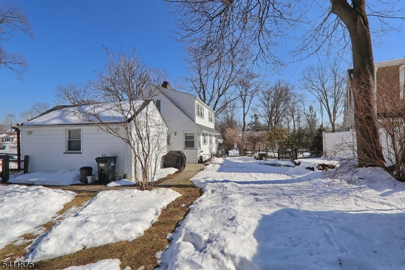 1314 Wood Valley Road Mountainside, NJ 07092 - Photo 34 of 40 a view of a house with snow on the road
