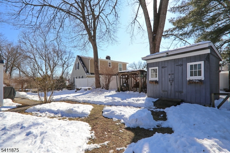 1314 Wood Valley Road Mountainside, NJ 07092 - Photo 35 of 40 a view of backyard with a barn