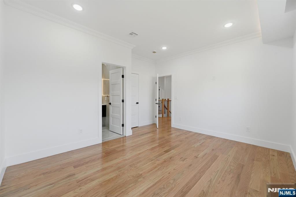 275 Longview Road Union, NJ 07083 - Photo 34 of 43 a view of an empty room with wooden floor