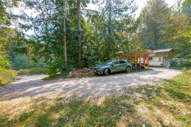 a car parked in front of a house