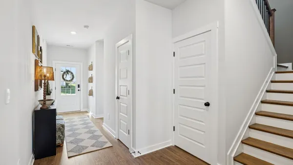 a kitchen with stainless steel appliances a sink stove and refrigerator