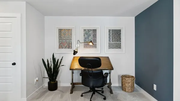 a view of a brick building with a large windows