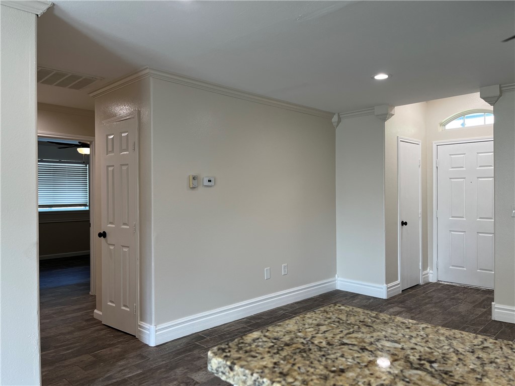 1219 Sacramento Street Portland, TX 78374 - Photo 13 of 40 a view of a hallway with wooden floor and closet