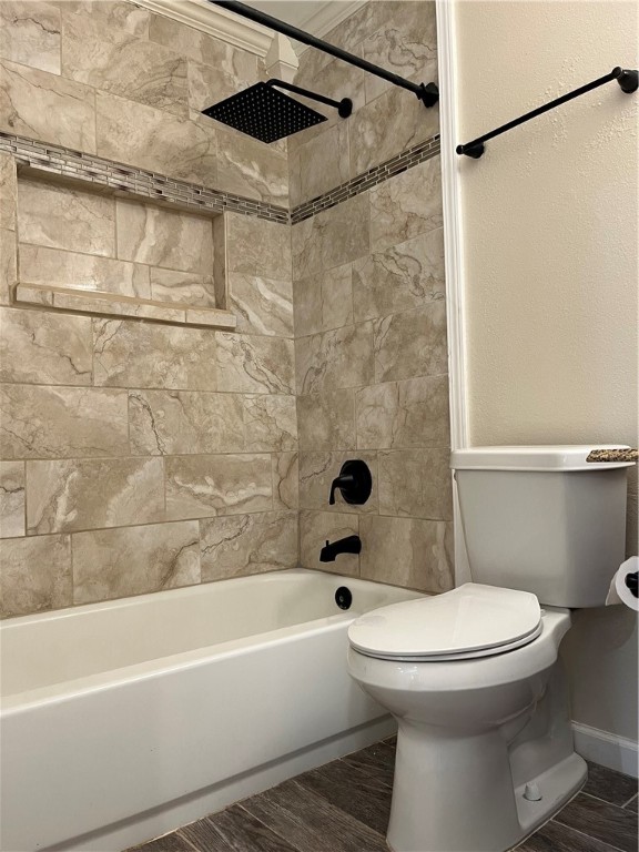 1219 Sacramento Street Portland, TX 78374 - Photo 31 of 40 a bathroom with a toilet and a shower