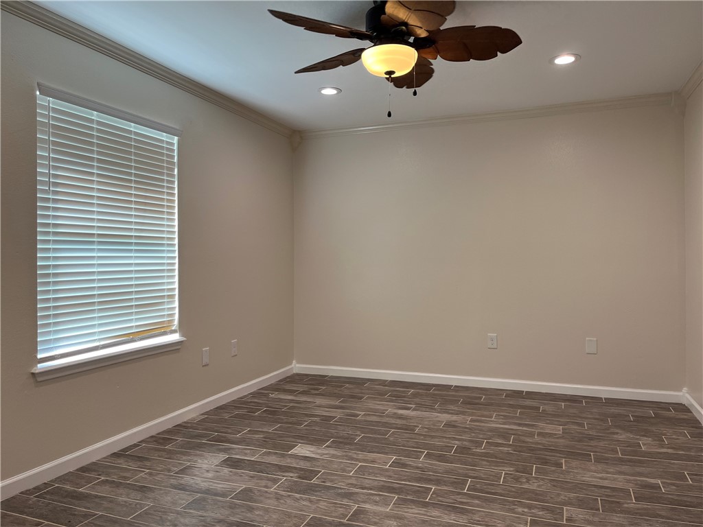 1219 Sacramento Street Portland, TX 78374 - Photo 33 of 40 wooden floor in an empty room with a window