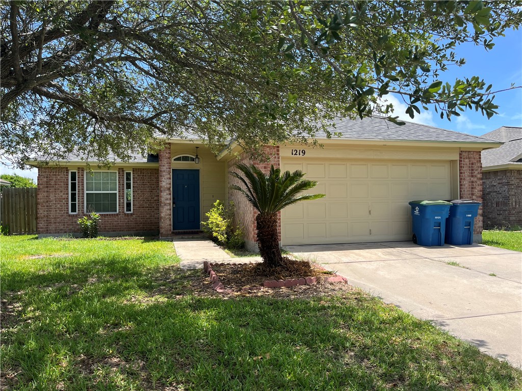 1219 Sacramento Street Portland, TX 78374 - Photo 40 of 40 a front view of a house with garden
