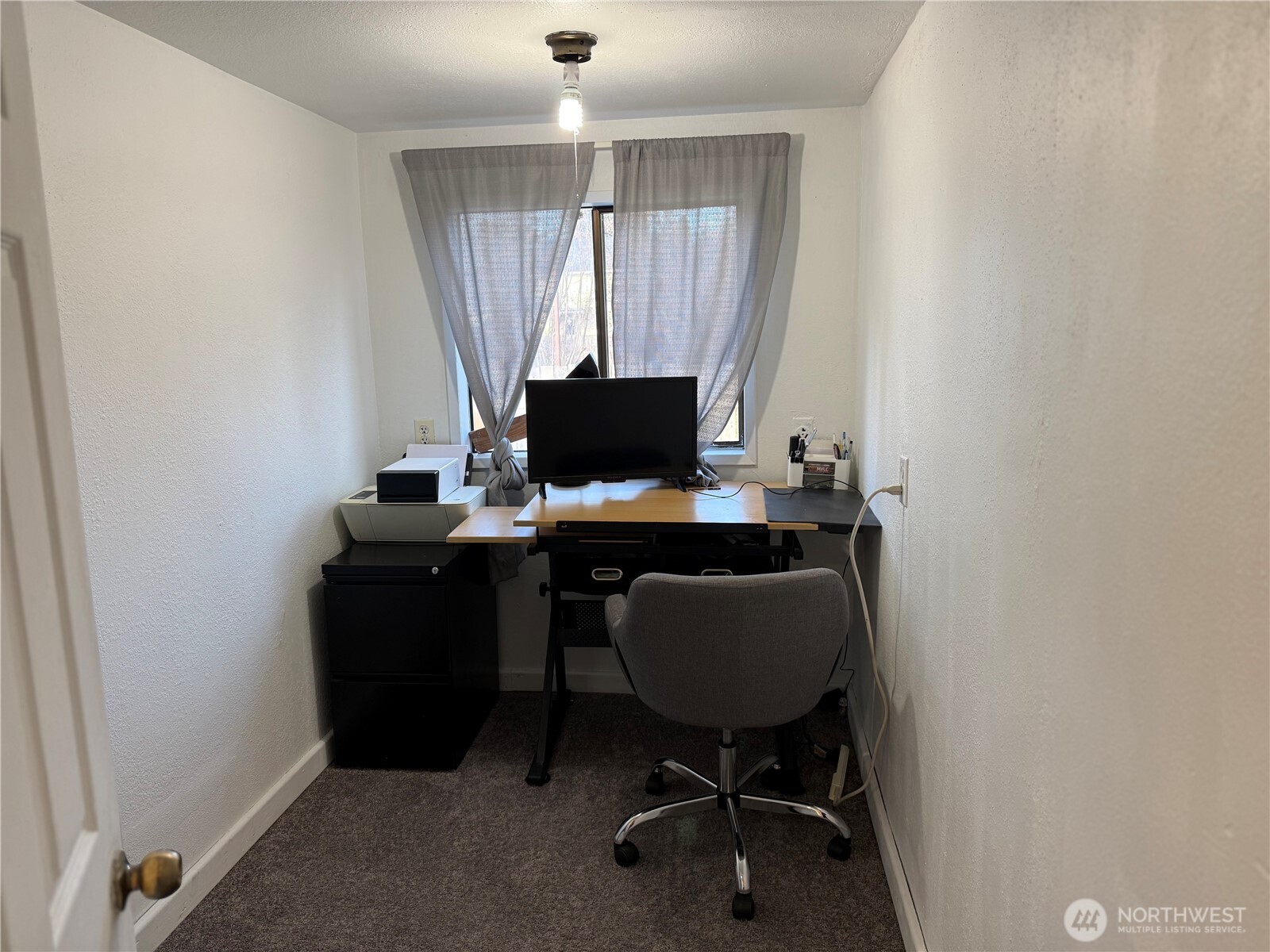 319 East Section Street Mount Vernon, WA 98273 - Photo 13 of 22 a view of a workspace with furniture