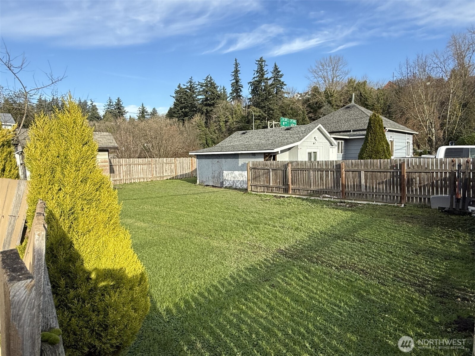 319 East Section Street Mount Vernon, WA 98273 - Photo 5 of 22 a view of a house with backyard and garden