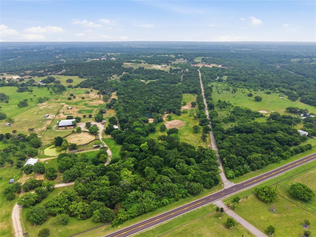 Tbd Manley Road Weatherford, TX 76088 - Photo 12 of 15 an aerial view of residential houses with outdoor space and trees