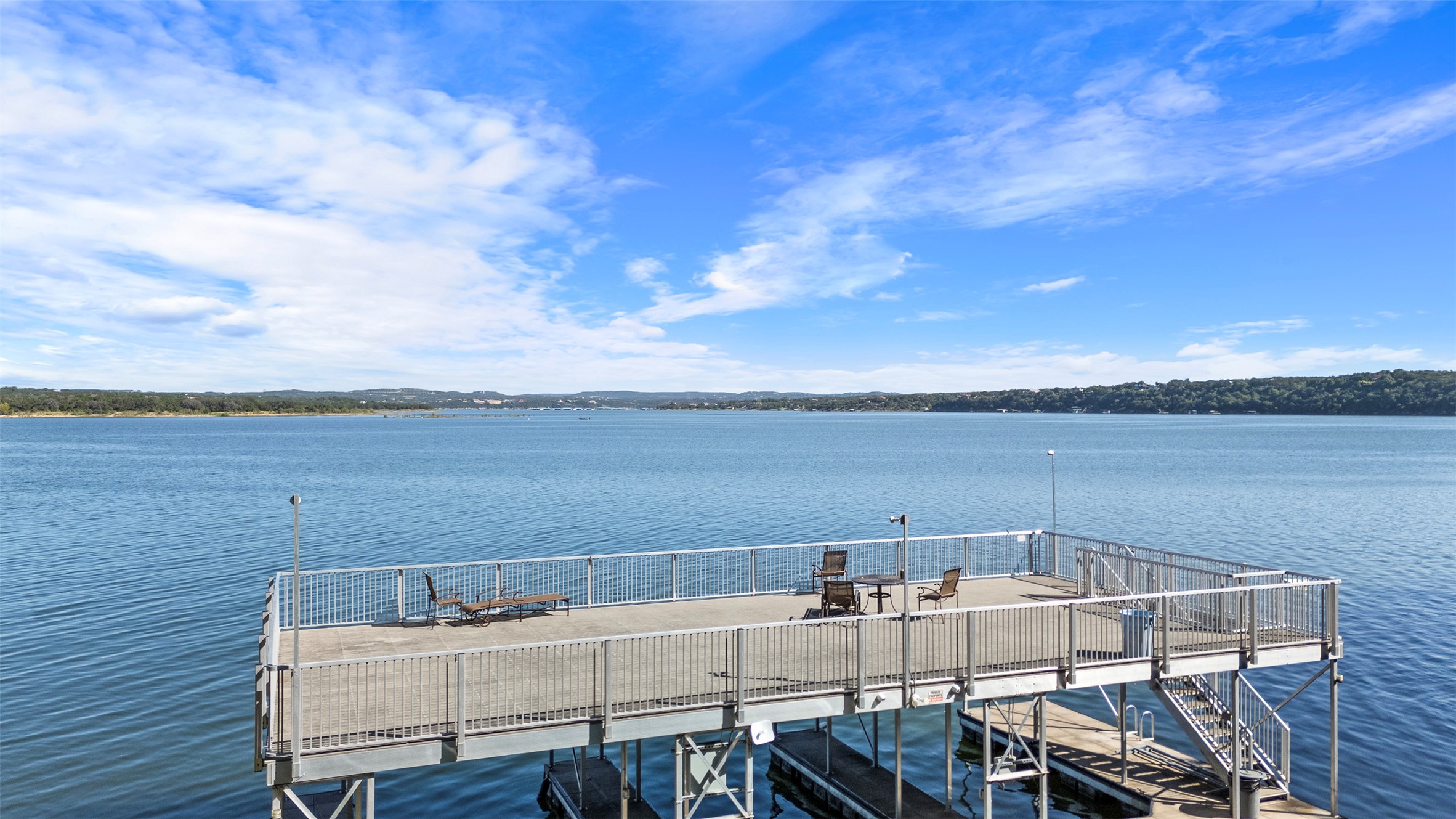 2918 Ranch Road 620 North, Unit C115 Austin, TX 78734 - Photo 24 of 39 Dock area featuring a water view