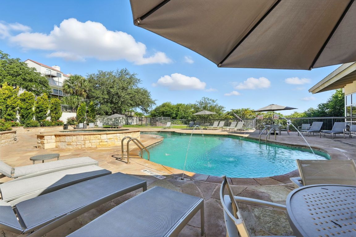 2918 Ranch Road 620 North, Unit C115 Austin, TX 78734 - Photo 30 of 39 Community pool featuring a patio area