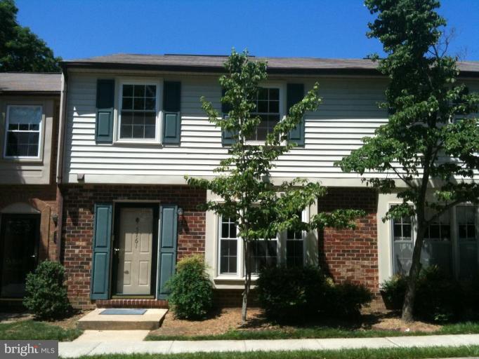 5761 Independence Circle Alexandria, VA 22312 - Photo 1 of 8 a front view of a house