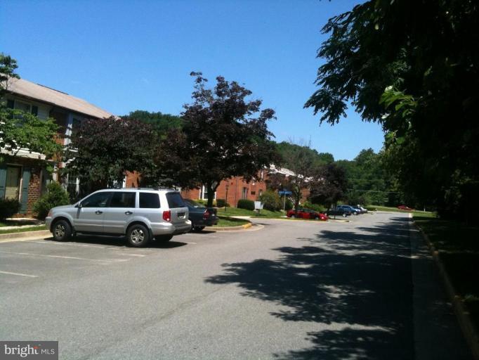5761 Independence Circle Alexandria, VA 22312 - Photo 7 of 8 a view of street with parked cars