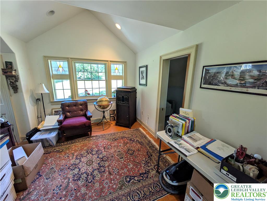 1731 Howell Road Easton, PA 18040 - Photo 38 of 60 Gleaming hardwood floors and a vaulted ceiling elevate this sunlit home office space.