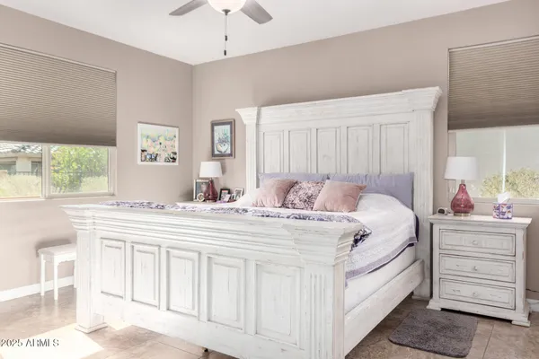 a bed room with a bed and a dresser