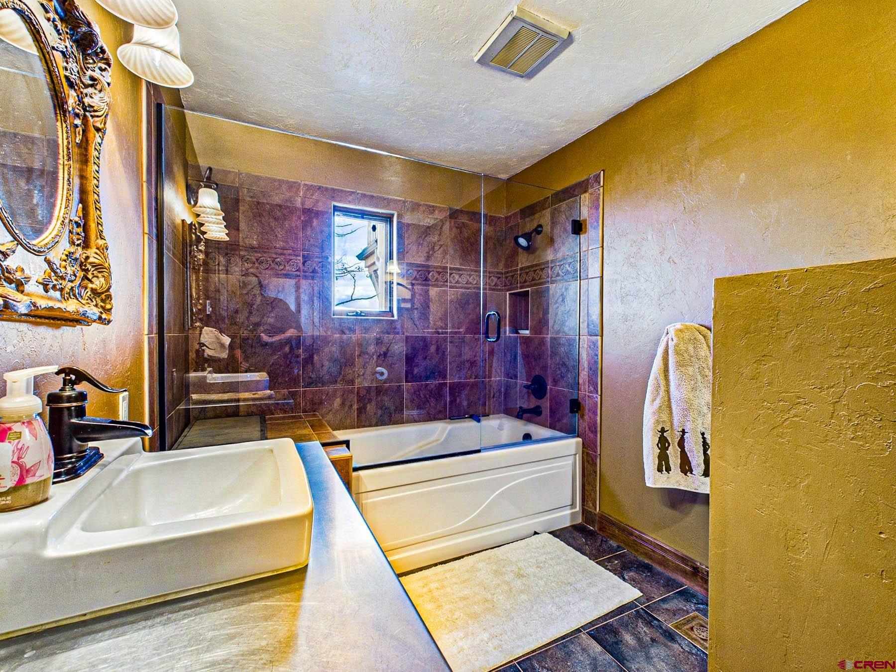 2741 7750th Road Crawford, CO 81415 - Photo 12 of 45 a bathroom with a sink and a bathtub