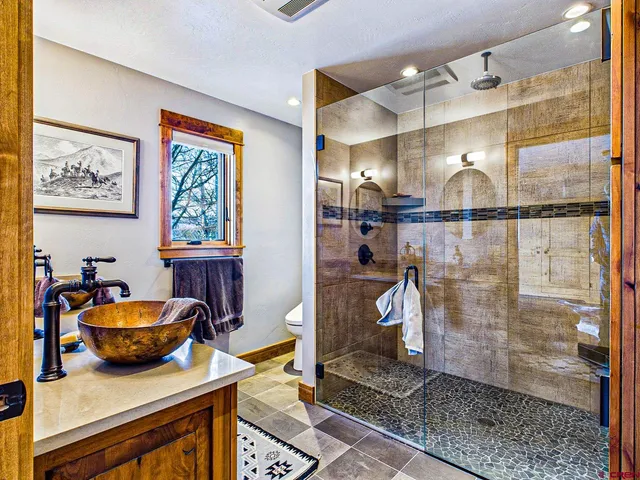 a room with furniture and a chandelier