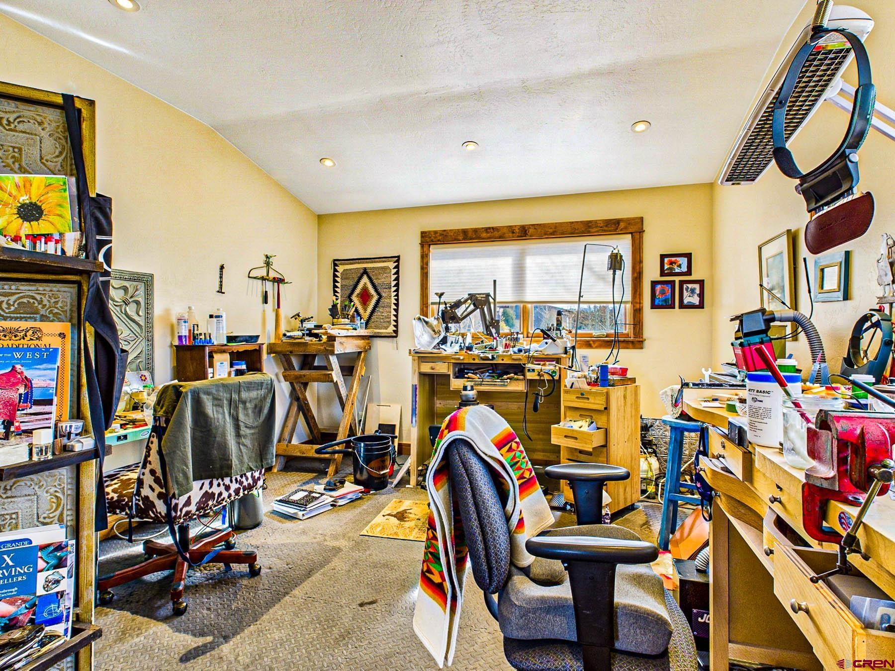 2741 7750th Road Crawford, CO 81415 - Photo 17 of 45 a view of a room with gym equipment