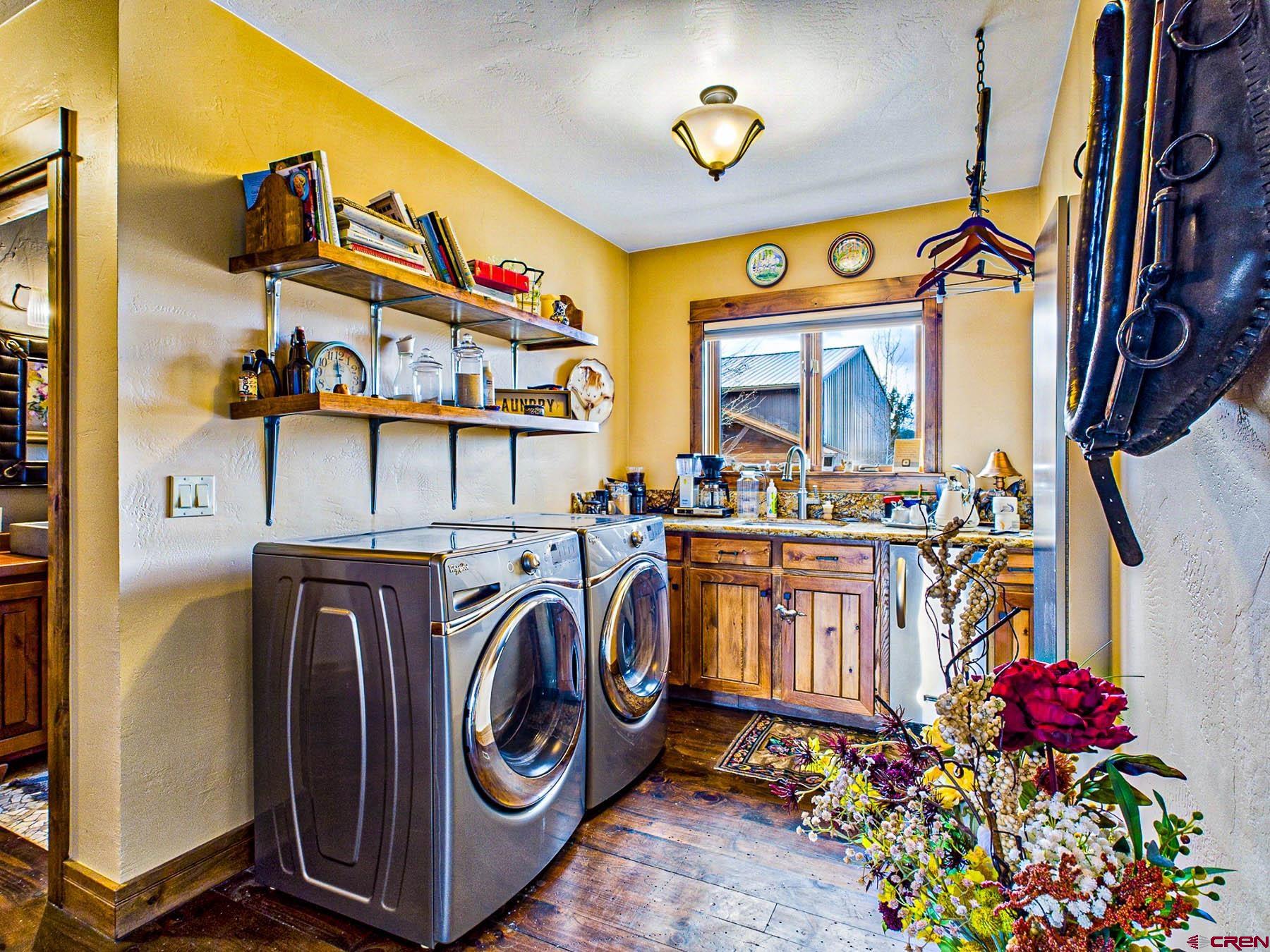 2741 7750th Road Crawford, CO 81415 - Photo 19 of 45 a utility room with dryer and washer
