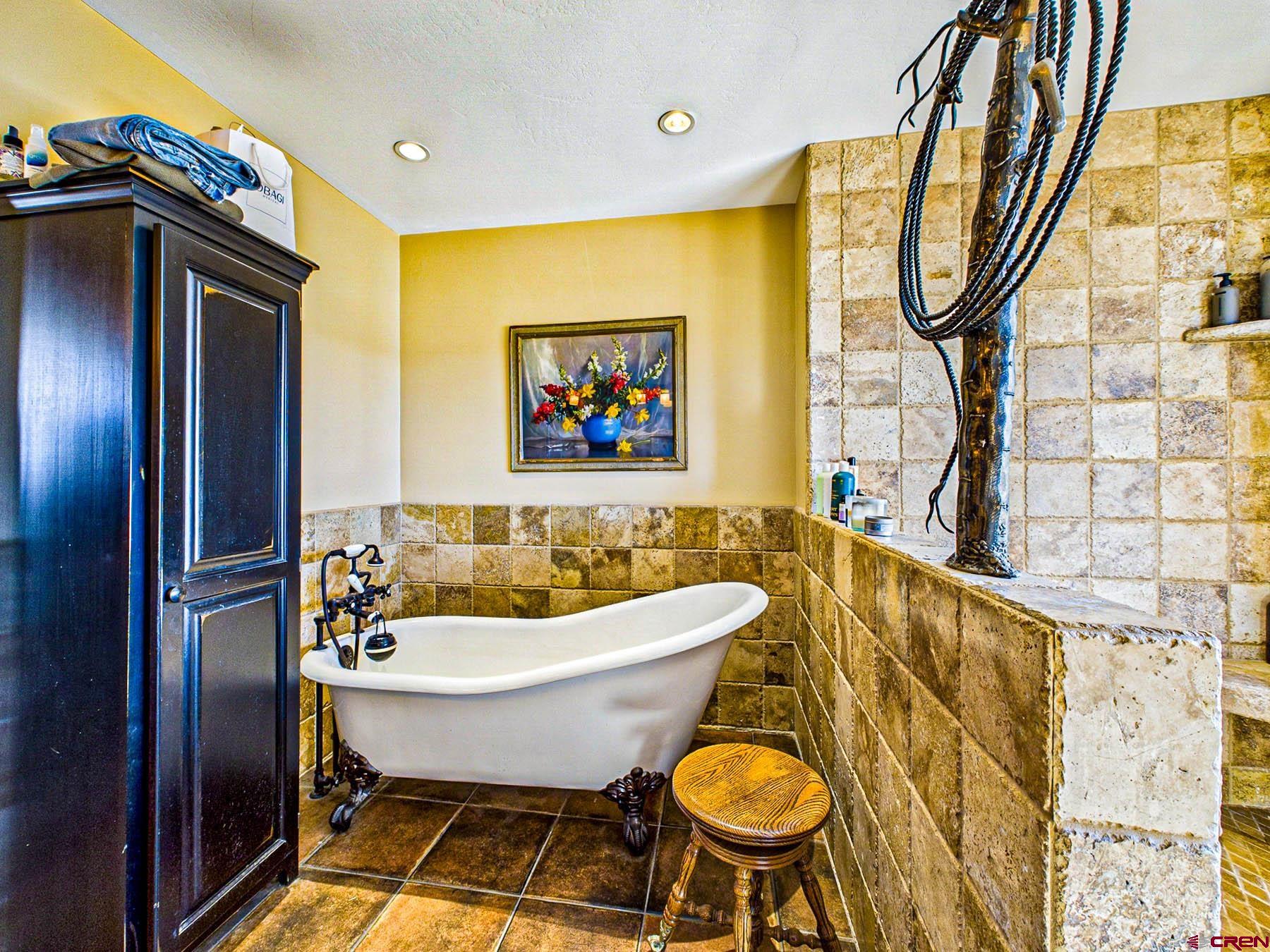 2741 7750th Road Crawford, CO 81415 - Photo 27 of 45 a bathroom with a sink and a mirror