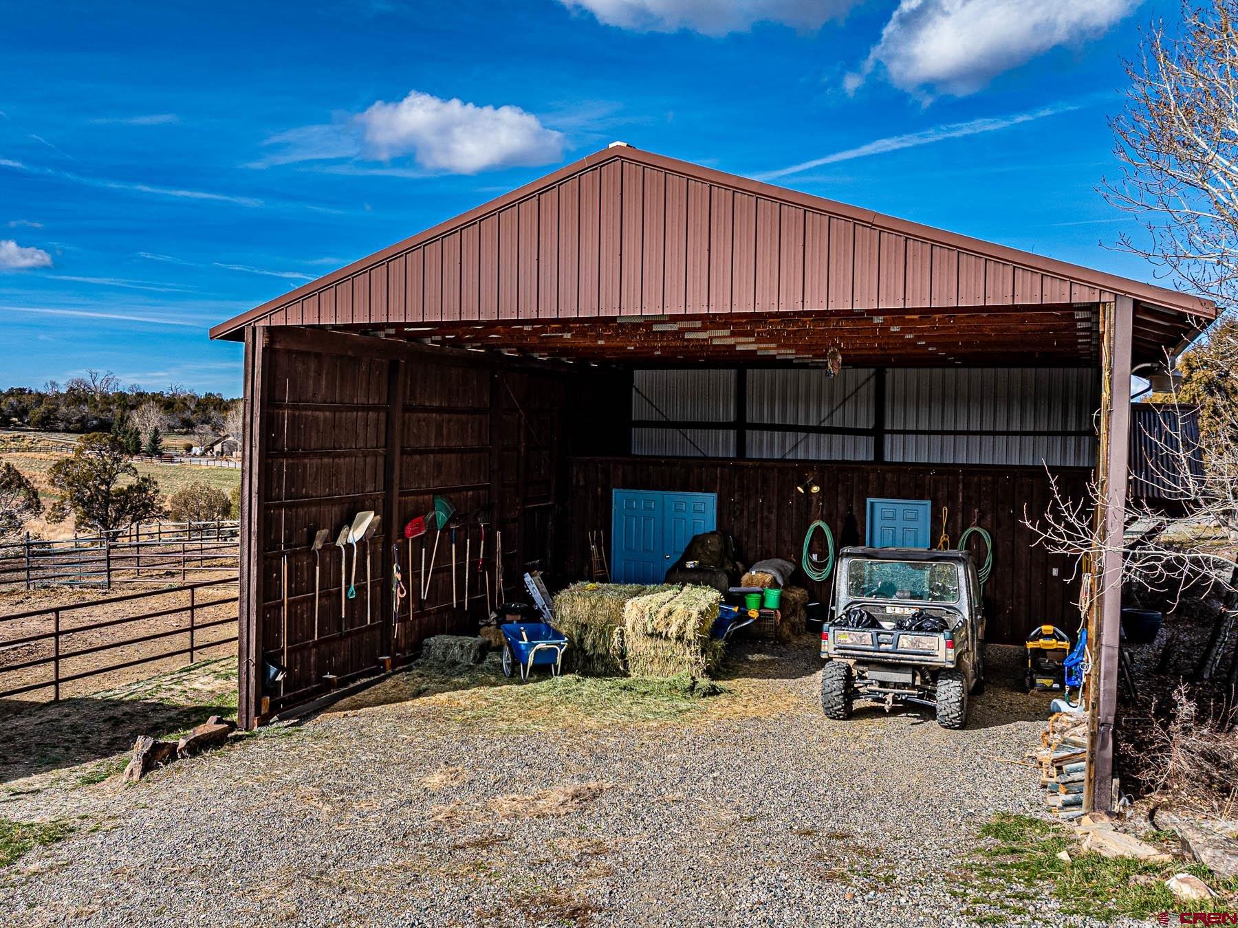 2741 7750th Road Crawford, CO 81415 - Photo 33 of 45 a view of back yard and deck with patio