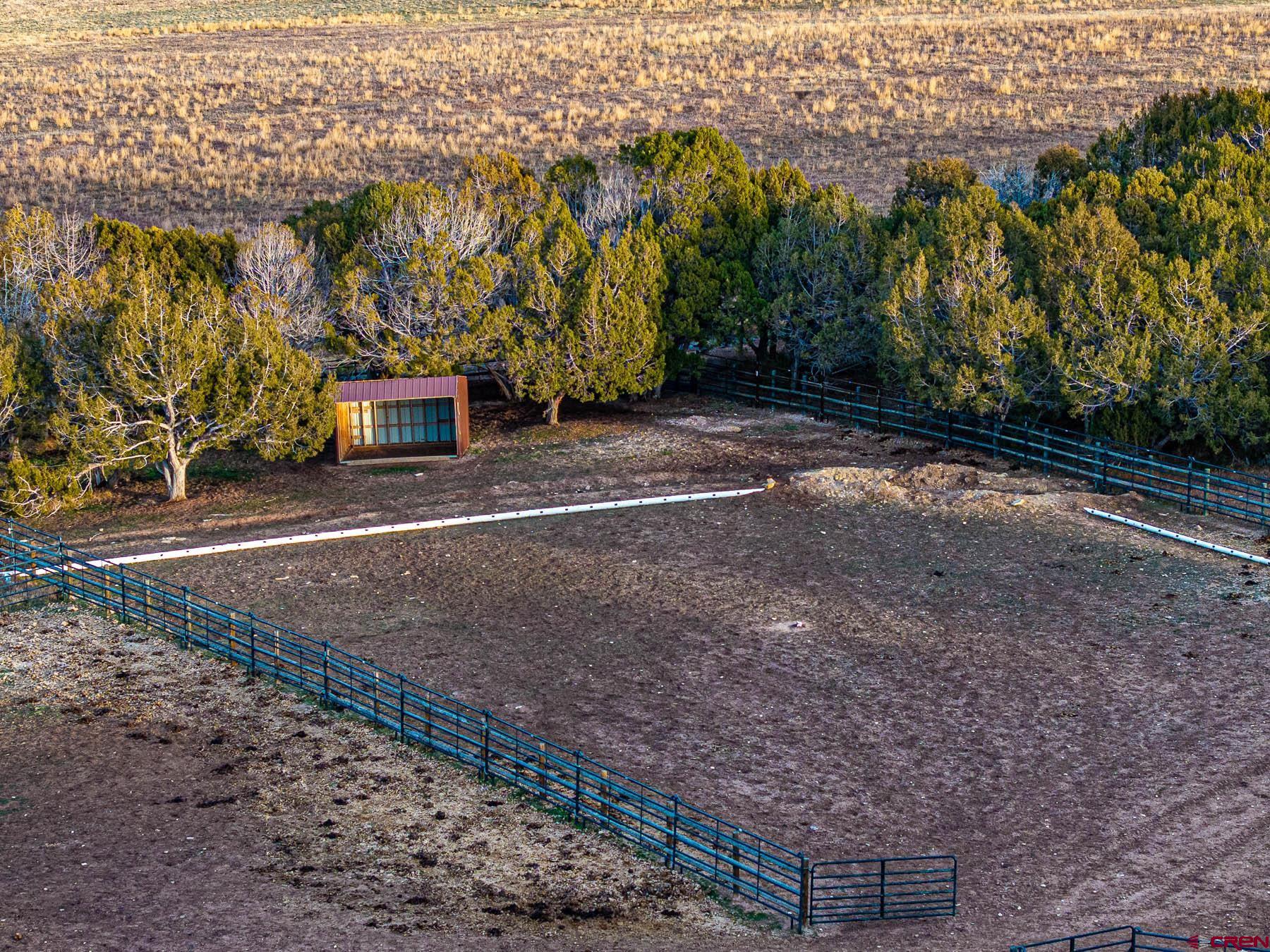 2741 7750th Road Crawford, CO 81415 - Photo 42 of 45 a view of a parking space with wooden fence