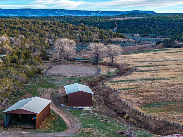 a view of a lake from a balcony