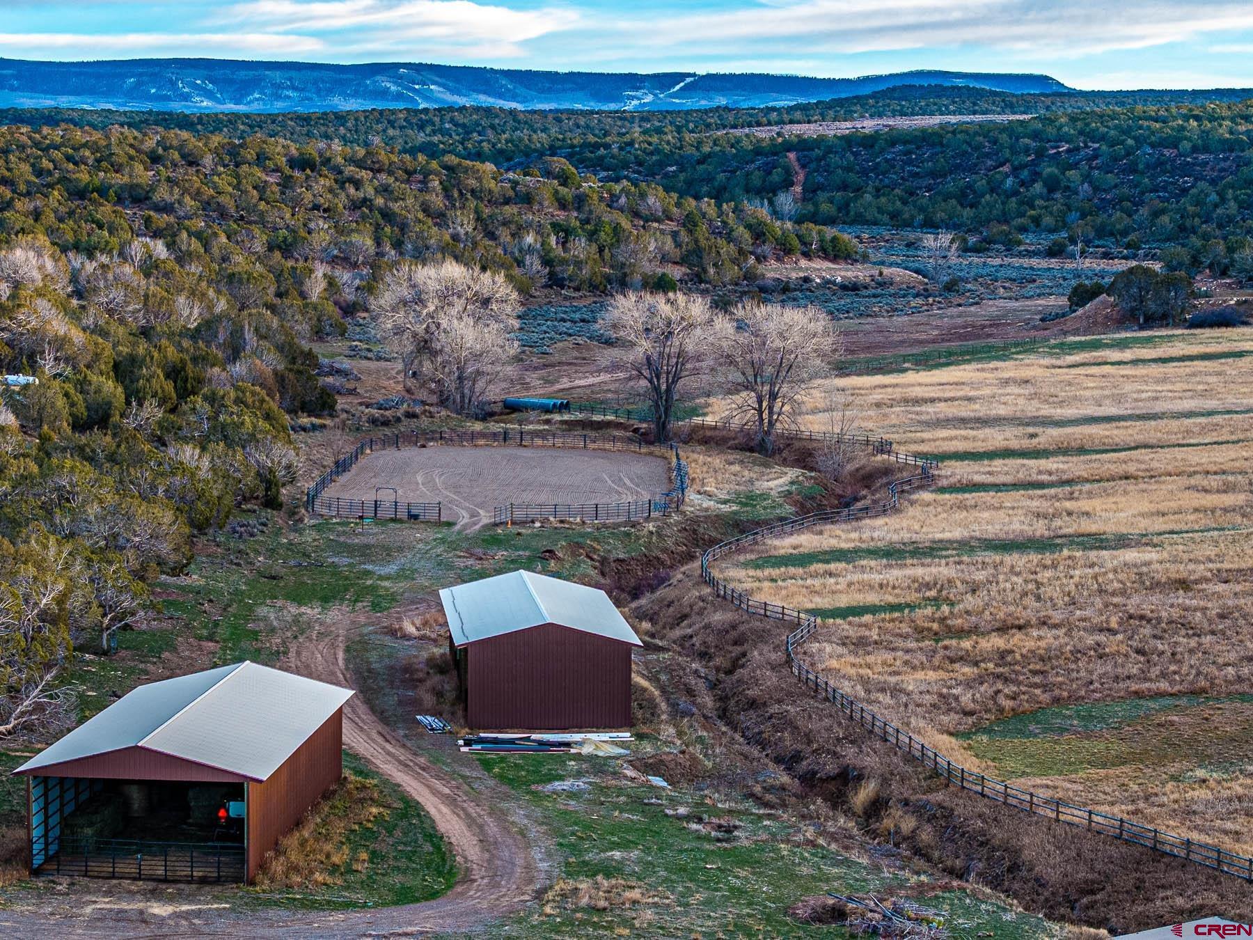 2741 7750th Road Crawford, CO 81415 - Photo 43 of 45 a view of a backyard with lawn chairs