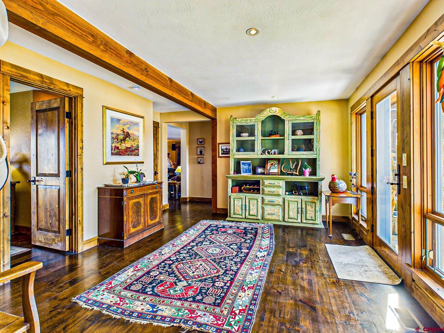 2741 7750th Road Crawford, CO 81415 - Photo 6 of 45 a bedroom with furniture and a rug