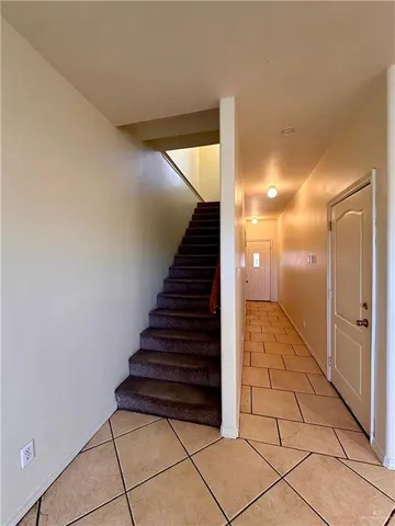 a view of entryway with stairs