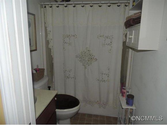 685 Lattimore Road Rutherfordton, NC 28139 - Photo 3 of 11 a bathroom with a shower and a toilet