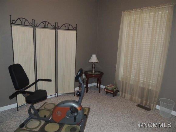 685 Lattimore Road Rutherfordton, NC 28139 - Photo 4 of 11 a view of a workspace with furniture and a window