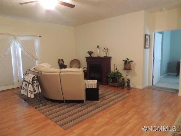 685 Lattimore Road Rutherfordton, NC 28139 - Photo 10 of 11 a living room with a couch and a table