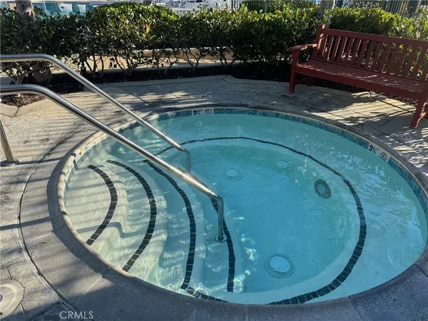 a view of swimming pool from a balcony